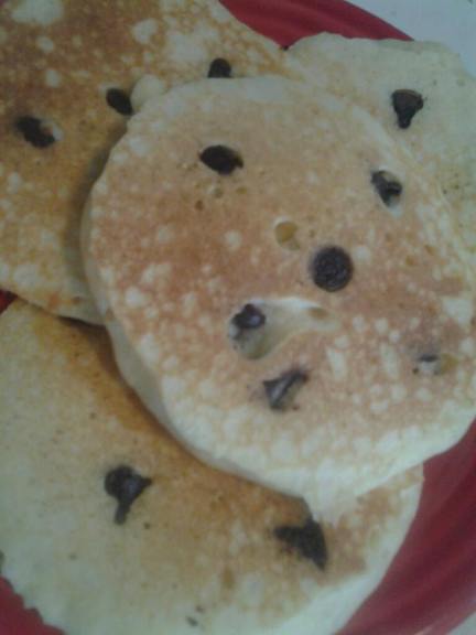 I added chocolate chips once I'd gotten each pancake on the griddle.  The kids are no longer starving!